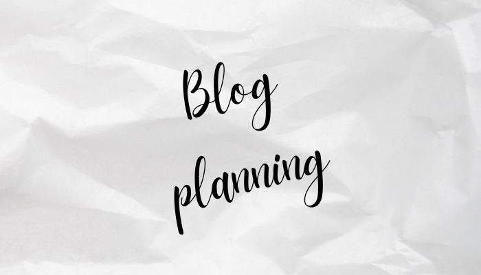 piece of paper with blog planning text written on it